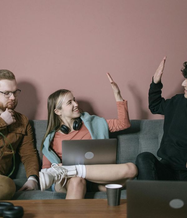 Woman feeling energetic and happy in a bright room.